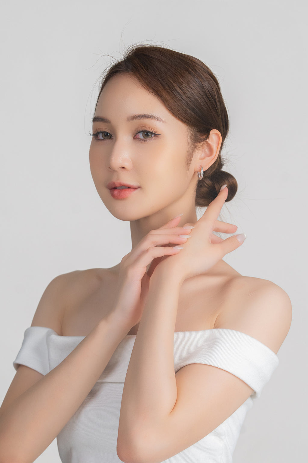 CELESTIAL TWIST HOOP EARRINGS