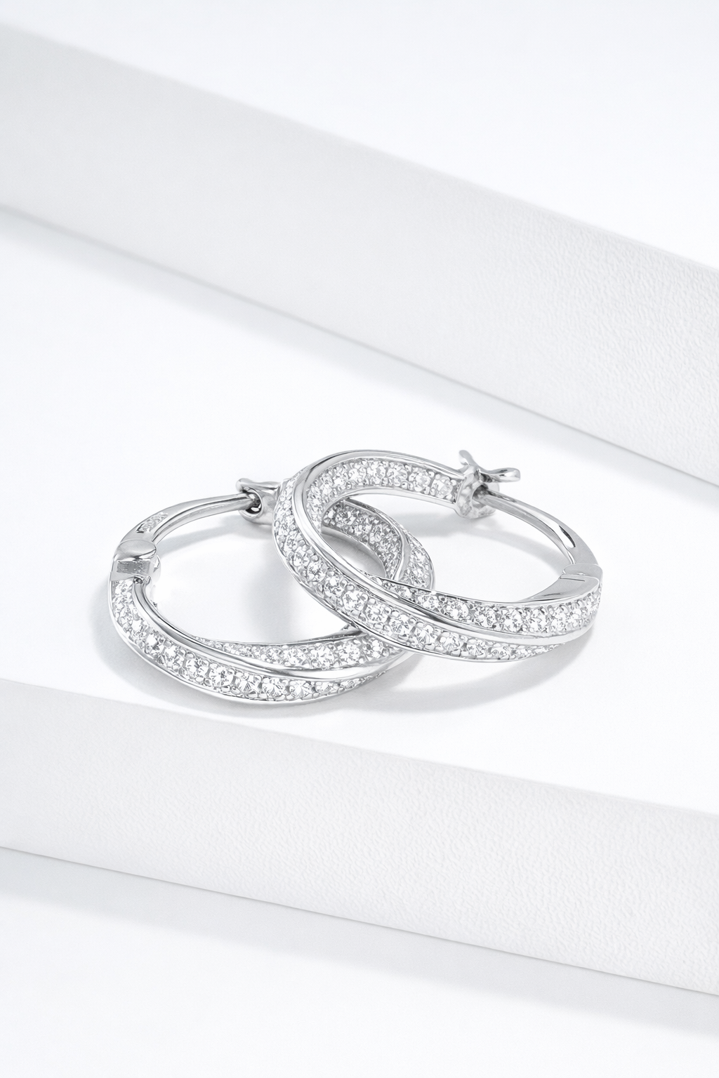 CELESTIAL TWIST HOOP EARRINGS
